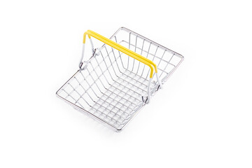 studio lighting. toy metal basket for products. On white background. Close-up.