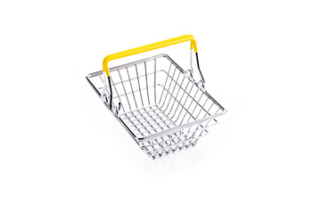 studio lighting. toy metal basket for products. On white background. Close-up.