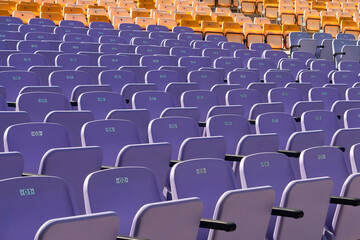 Naklejka premium Empty plastic chairs background