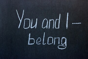 
Chalkboard lettering You and I belong. Motivational lettering