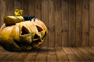 Halloween pumpkins on rocks at night