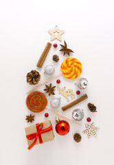 Creative concept holiday celebration photo of christmas tree toys balls decoration on white background.