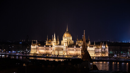 Fototapeta na wymiar Panorama of city and Hungarian Parliament Building. Night in Budapest, Hungary.