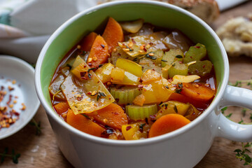 Chunky vegetable soup with carrots, leek, and cabbage