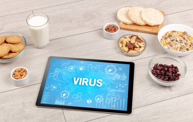 Healthy Tablet Pc compostion with VIRUS inscription, immune system boost concept