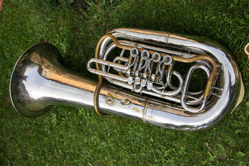 Tuba on green grass