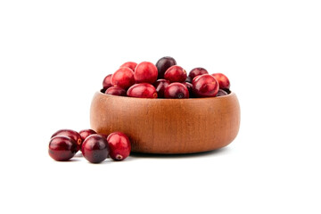 Cranberries in wooden bowl isolated on white