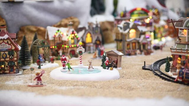 PARIS, FRANCE - NOVEMBER 29, 2019: Winter scene from ceramic figures for Christmas in a shop