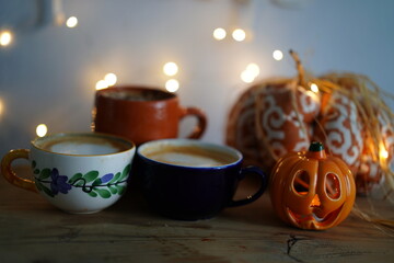 pottery mugs and pumpkins