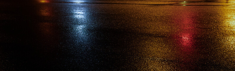 Wet asphalt, night view, neon reflection on the concrete floor. Night empty stage. Dark abstract background, dark street. Night city after rain, wet surface. Blurred background, night bokeh.