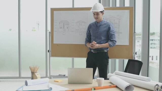 Business concept. Engineers present the project at the meeting. 4k Resolution.