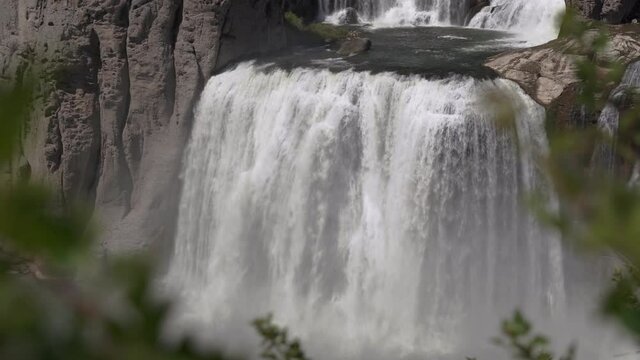 Magnificent White Water Waterfall through the Leaves | Shoshone Falls in Idaho | 4K