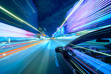 View from Side of a Black Car moving in a night city, Blured road with lights with car on high...