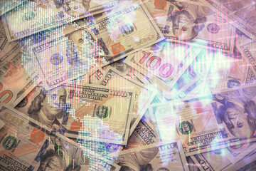 Multi exposure of forex chart drawing over us dollars bill background. Concept of financial success markets.