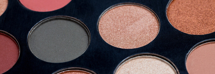 Colorful eye shadows palette. Colorful make-up palette background.