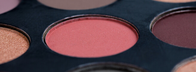 Colorful eye shadows palette. Colorful make-up palette background.