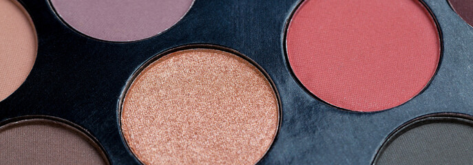 Colorful eye shadows palette. Colorful make-up palette background.