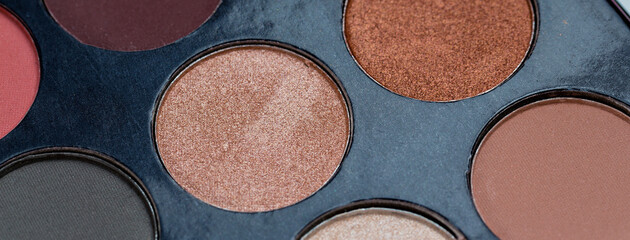 Colorful eye shadows palette. Colorful make-up palette background.