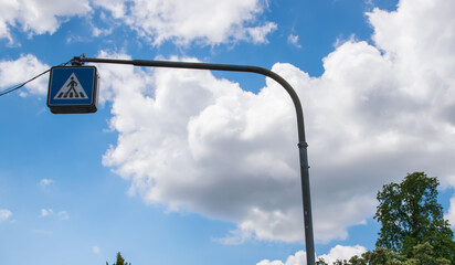 Road traffic sign with sky in summer sun day.