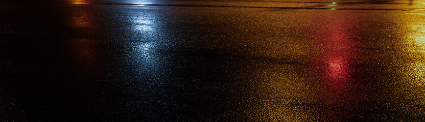 Fototapeta na wymiar Wet asphalt, night view, neon reflection on the concrete floor. Night empty stage. Dark abstract background, dark street. Night city after rain, wet surface. Blurred background, night bokeh.
