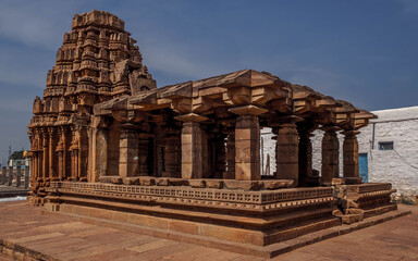 Fototapeta premium Badami, a small town in central Karnataka, is famous for its four rocky cave temples carved from a reddish sandstone in the mountain