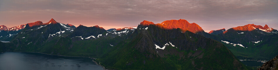 Sunset over Senja island in Northern Norway , mount Hesten in the middle of frame. (high ISO image)