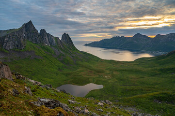 Sunset over Senja island in Northern Norway , mount Hesten in the middle of frame. (high ISO image)