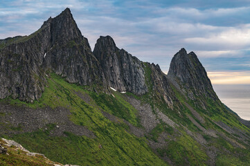 Sunset over Senja island in Northern Norway , mount Hesten in the middle of frame. (high ISO image)