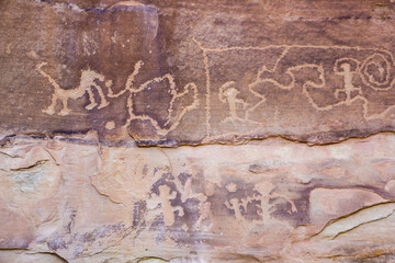 Ancient petroglyphs written by the ancient Pueblo people on a rock in Mesa Verde National Park (Colorado).