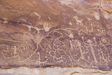 Ancient petroglyphs written by the ancient Pueblo people on a rock in Mesa Verde National Park (Colorado).