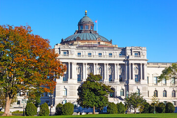 Thomas Jefferson Building is a part of the United States Library of Congress in Washington DC, USA. The Beaux-Arts style of historic building under blue skies in autumn. - 387684589