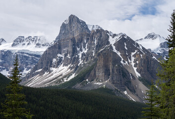 Fototapeta na wymiar Majestic peak of Mount Babel isolated, shot on a overcast day at Moraine Lake road, Banff National Park, Alberta, Canada