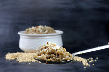 Lapsi,Halwa or Sheera i Indian Traditional and healthy sweet made from wheat or sorghum with milk nad desi ghee during festival seasons.