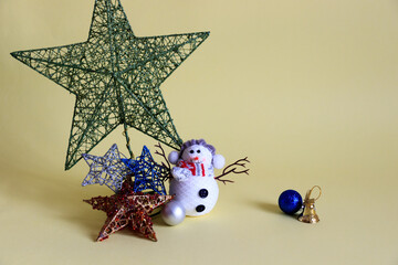 christmas star decorations on a yellow background