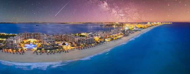 Cancun beach with milky way galaxy