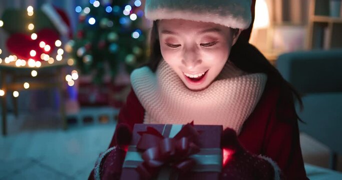 asian woman open present box