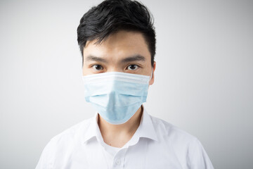 Man with mask isolated on blank background