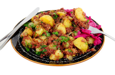 Corned beef hash meal with pickled red cabbage isolated on a white background
