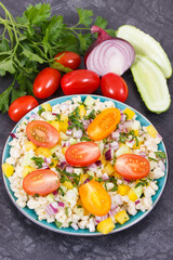 Fresh salad with bulgur groats and vegetables as best food for dieting and slimming