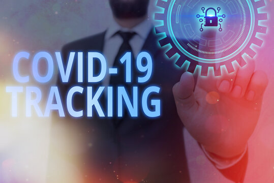 Writing note showing Covid 19 Tracking. Business concept for Distinguishing process of the possible infected individuals Graphics padlock for web data information security application system