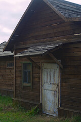 Fototapeta na wymiar entrance to an old wooden rural house