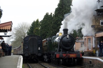 Fototapeta na wymiar Steam train in the station 