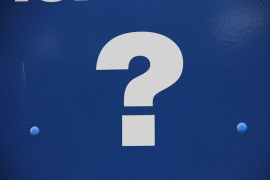 The Big Question Mark. Why?
White On Dark Blue Painted Wall