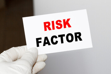 RISK FACTOR Doctor showing medical information, diagnosis, isolated on a white background, close-up, cropped view.