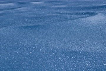 Fototapeta na wymiar Winter background, blue snow, Christmas theme, snow texture with copy space