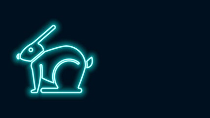 Glowing neon line Easter rabbit icon isolated on black background. Easter Bunny. 4K Video motion graphic animation
