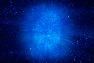 Majestic blue-purple sparkle snow. Christmas background for design, cards, posters. Cosmic star explosion.