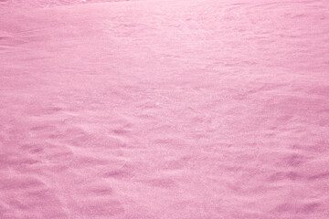 Winter background, pink snow, Christmas theme, snow texture with copy space