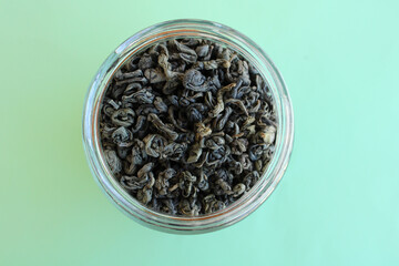 green tea dry leaves, top view