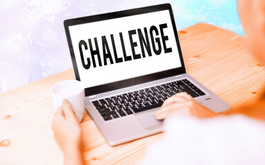 Conceptual hand writing showing Challenge. Concept meaning process of provoking or testing physiological activity by exposure Modern gadgets white screen under colorful bokeh background